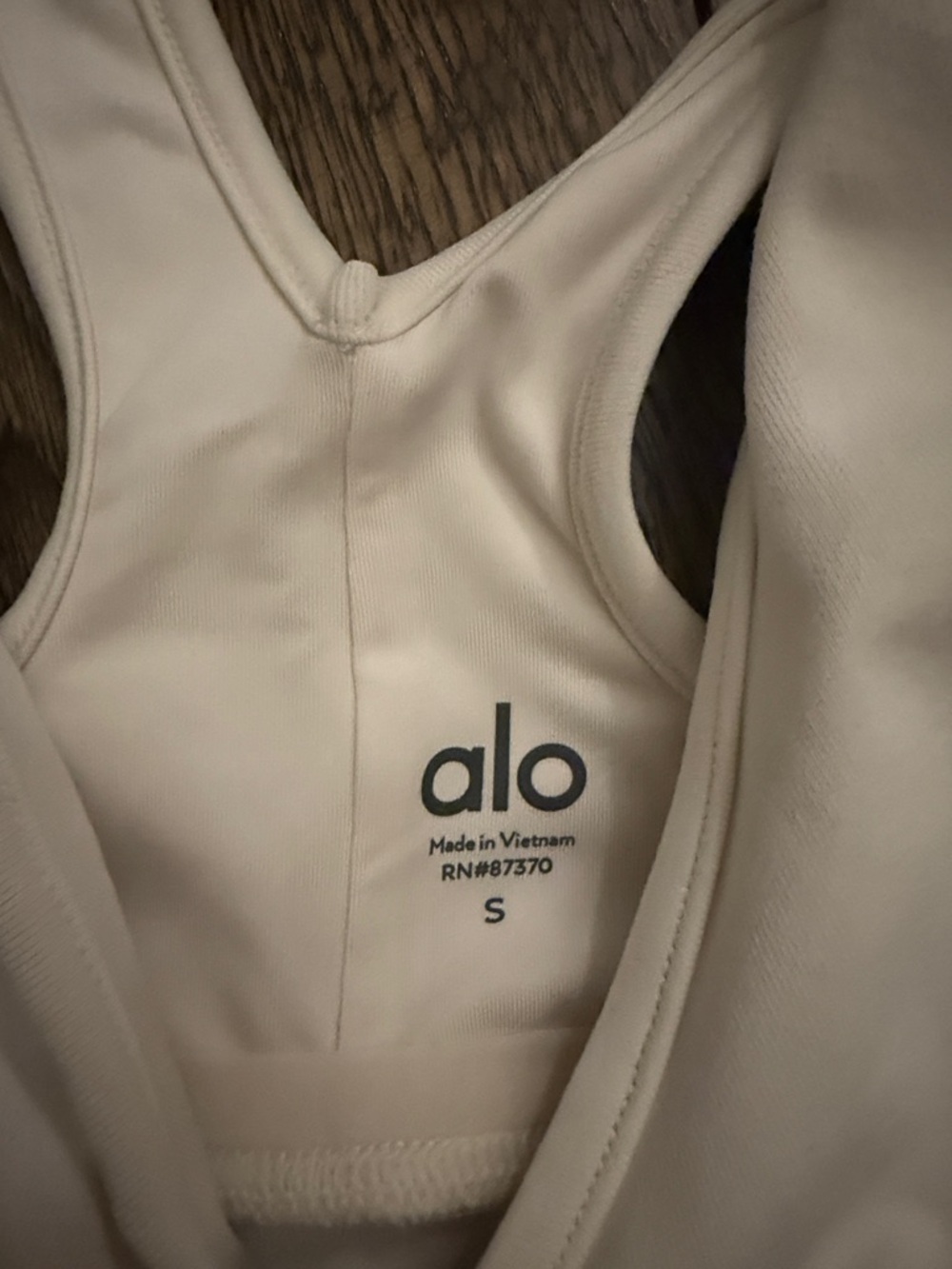 ALO Yoga Cream Ruched V‑Neck Workout Bra - Picture 3 of 3